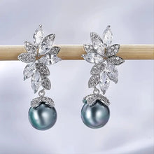 Laden Sie das Bild in den Galerie-Viewer, Multi Colored Imitation Pearl Dangle Earrings Leaf Design Aesthetic Earrings for Women Dazzling CZ Luxury Trendy Jewelry